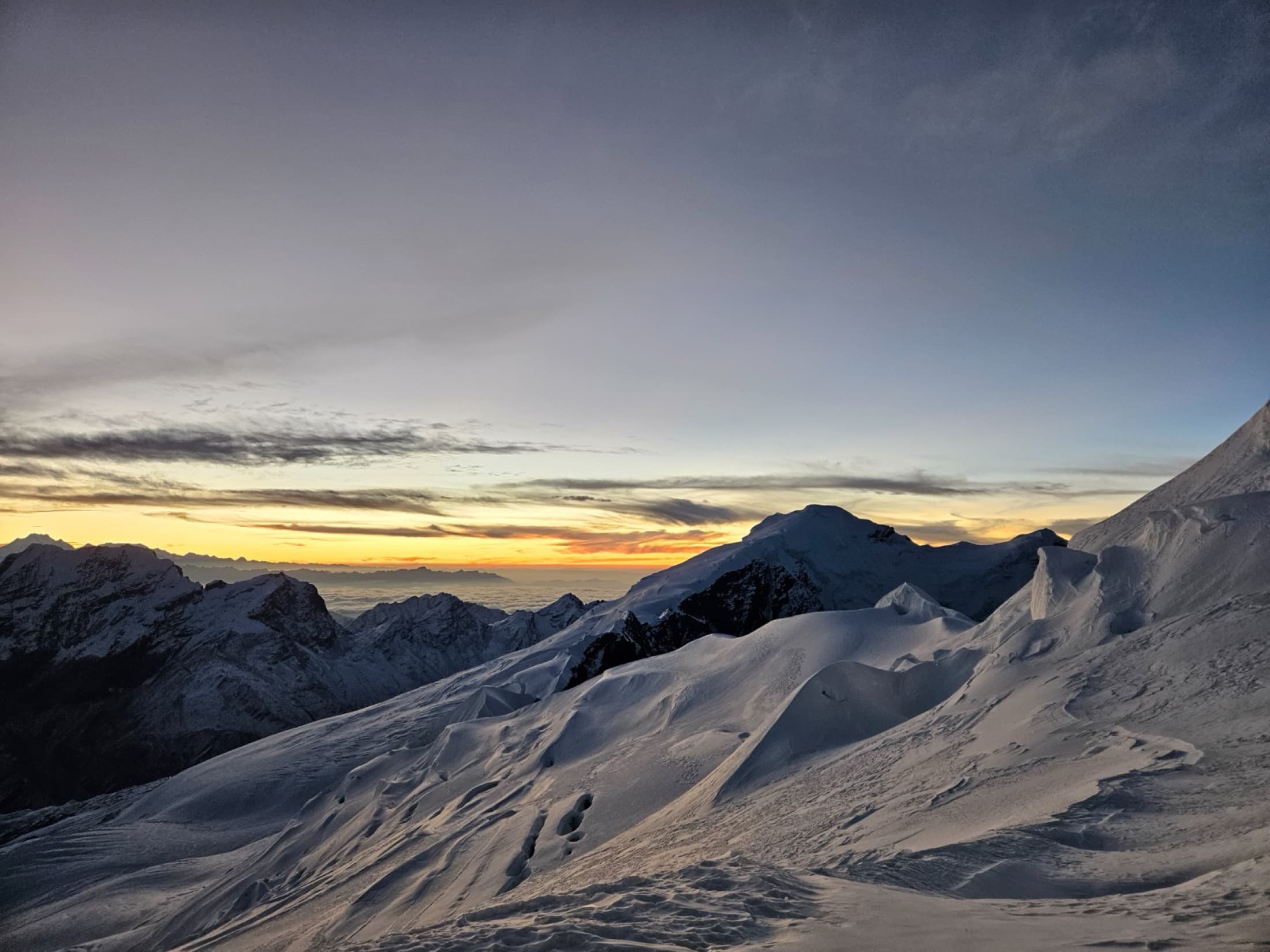 Sunrise glow over snow-capped Himalayan peaks